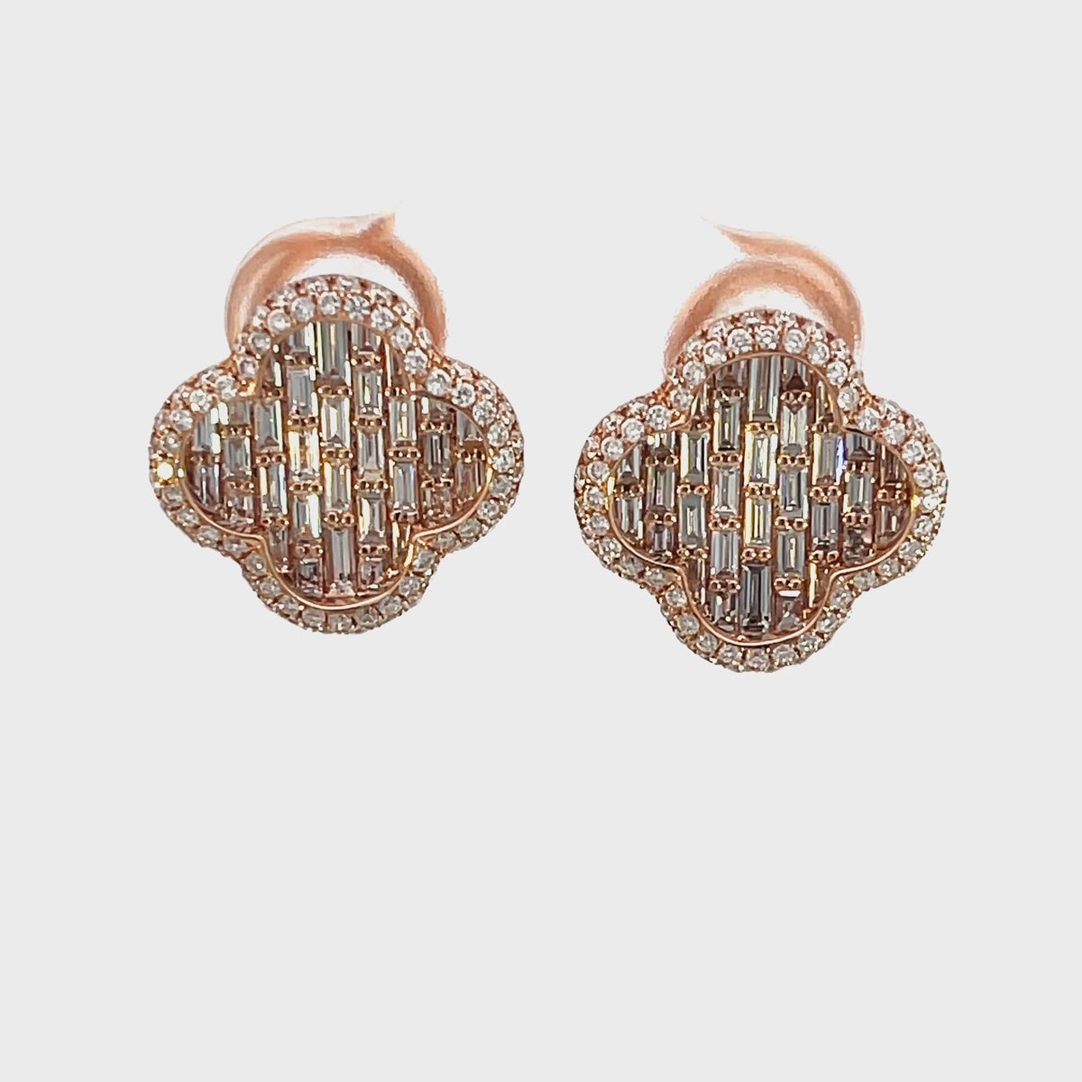 14K Rose gold Clover shaped Omega back diamond earrings with intricate baguette lattice design