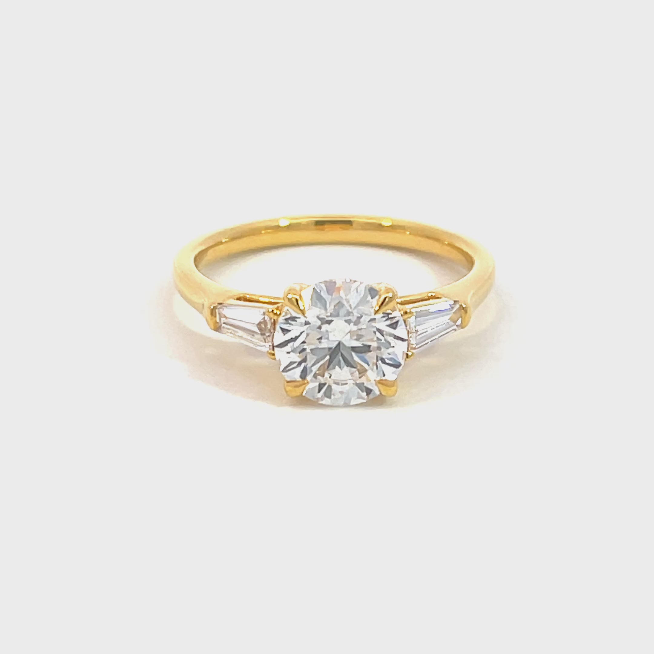 14K Yellow Gold Lab Grown Diamond Ring with Round Brilliant Center Stone and Tapered Baguette Side Stones