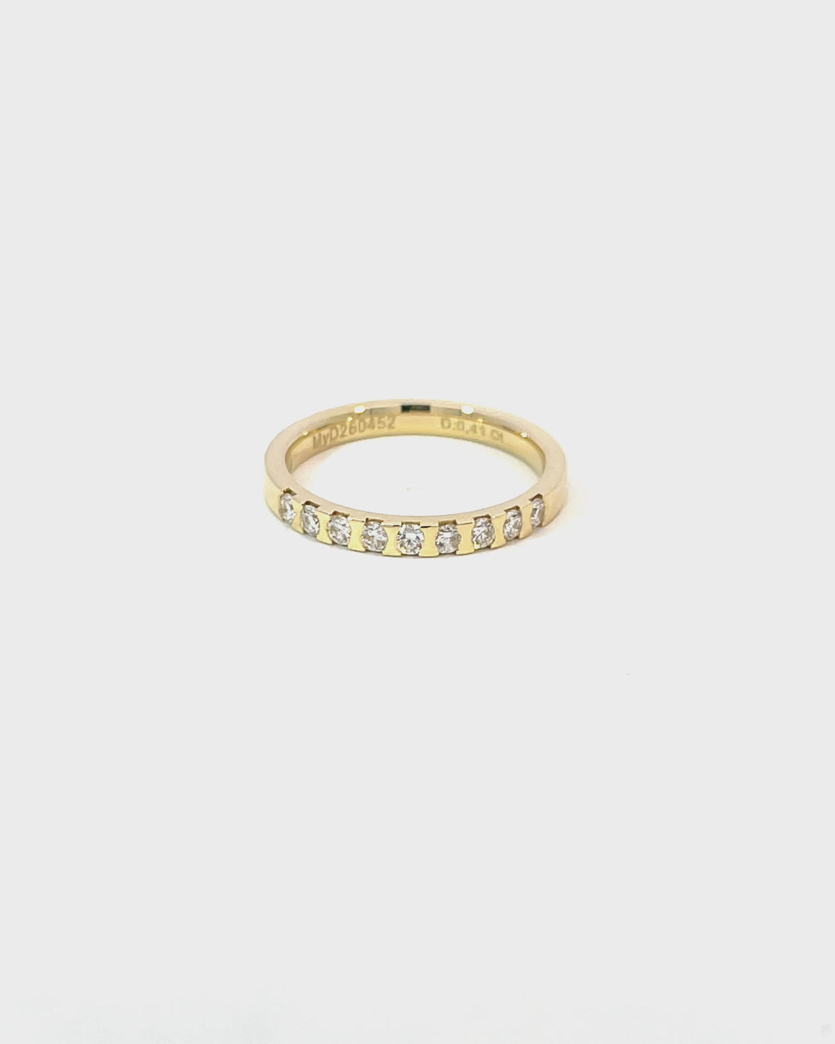 14K Yellow Gold Wedding Band with 9 Diamonds in Shared Bar Setting